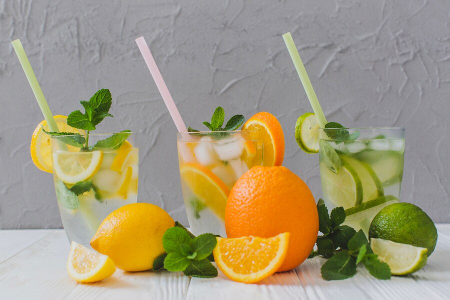 Glass of water with lemon slices.