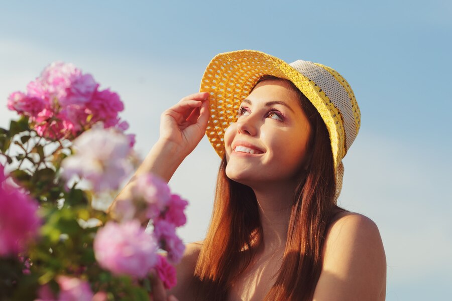 Bright summer day with glowing skin—summer skincare essentials for sunny days.